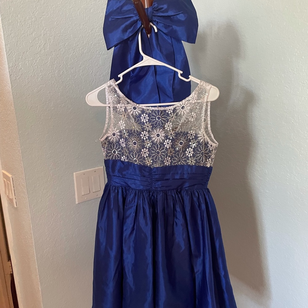 Beautiful blue dress for any special occasion for a young girl